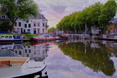 Utrecht, the netherlands - reflections of historic houses and boats the oudegracht canal.