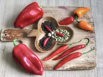 High angle view of chili peppers on table