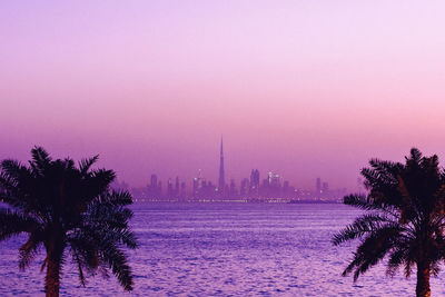 Scenic view of city during sunset