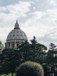 View of temple building against cloudy sky