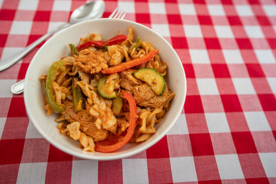 High angle view of noodles in plate on table