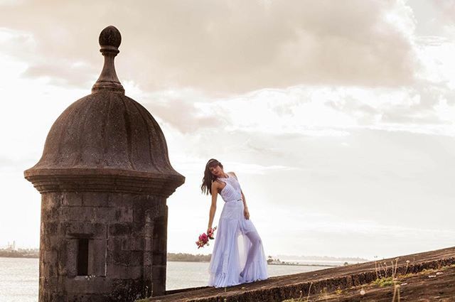 lifestyles, rear view, leisure activity, sky, standing, casual clothing, water, three quarter length, sea, full length, young adult, waist up, sitting, cloud - sky, focus on foreground, person, young women, side view