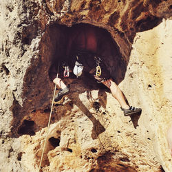 Close-up of man standing on rock