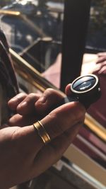 Close-up of man holding hands