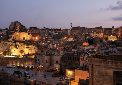 High angle view of illuminated buildings in city