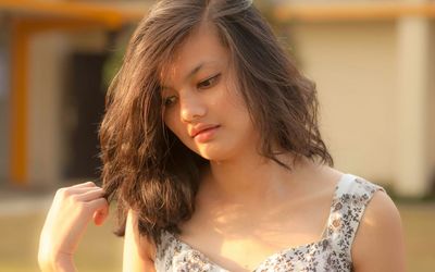 Close-up portrait of young woman