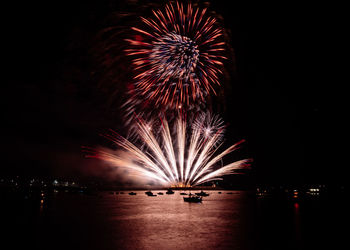 Firework display at night