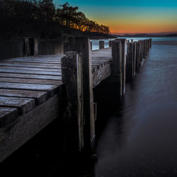 Pier over sea against sky