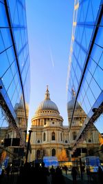 Group of people in front of buildings, st paul's cathedral in the city of london 