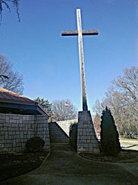 Low angle view of built structure against clear blue sky