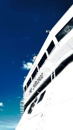 Low angle view of building against blue sky