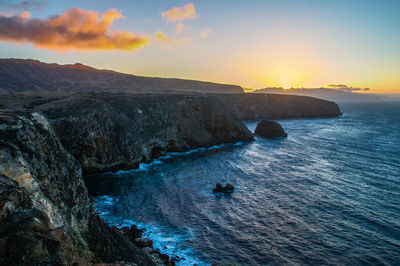 Scenic view of sea against sky during sunset