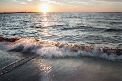 Scenic view of sea against sky during sunset