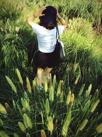 Rear view of man in field