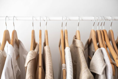 Close-up of clothes hanging on rack