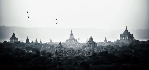 Panoramic view of silhouette cathedral against clear sky