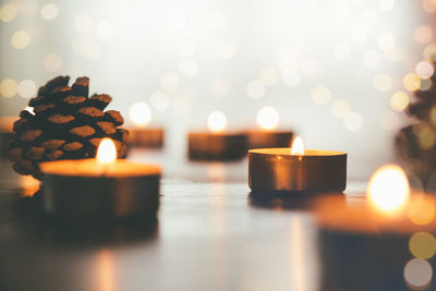 Close-up of burning candles during christmas