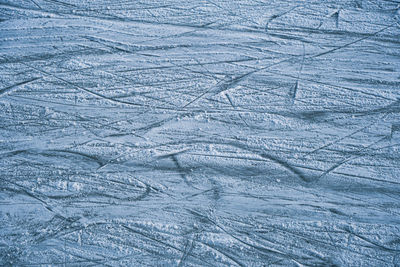 Ice in skate scratches, close view