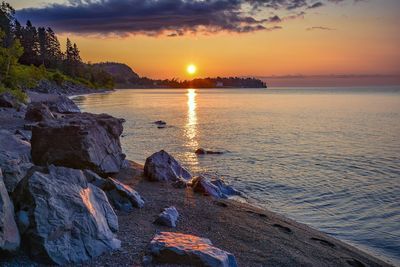 Scenic view of sea against sky during sunset