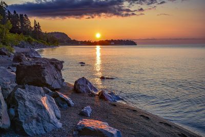 Scenic view of sea against sky during sunset
