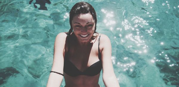 Young woman in swimming pool