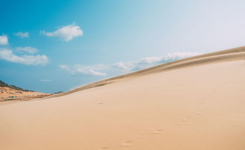 Scenic view of desert against sky