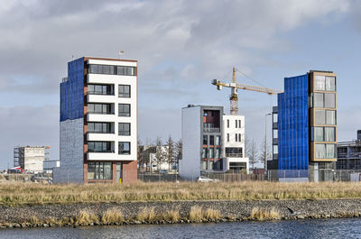 Three houses under construction in amsterdam