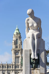 Statue of historic building against clear sky