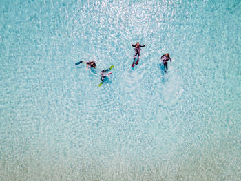 High angle view of people enjoying in water