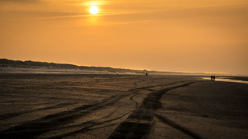 Scenic view of sea at sunset