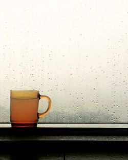 Close-up of wet coffee cup