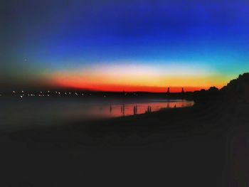 Scenic view of sea against sky at sunset