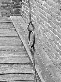 High angle view of metal hanging against wall