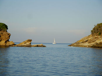 Scenic view of sea against blue sky