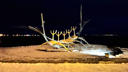 Light painting against sky at night