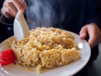 Close-up of hand holding food