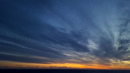 Scenic view of dramatic sky over sea