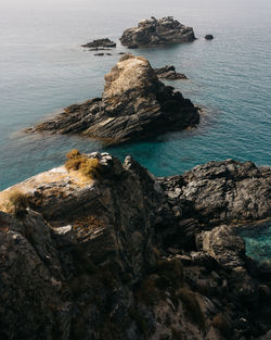 High angle view of rock formation in sea