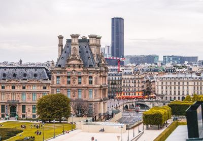 Buildings in city against sky