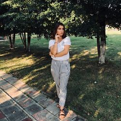 Portrait of girl standing in park