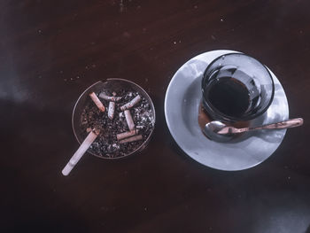 High angle view of coffee cup on table