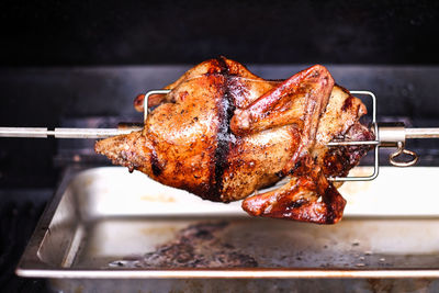 Close-up of meat on barbecue grill