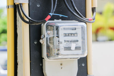 Close-up of electric meter outdoors