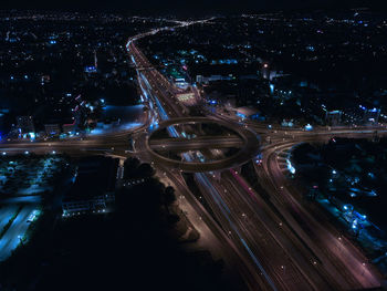 High angle view of illuminated cityscape at night