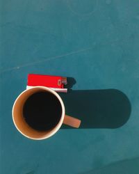 Directly above shot of coffee cup on table