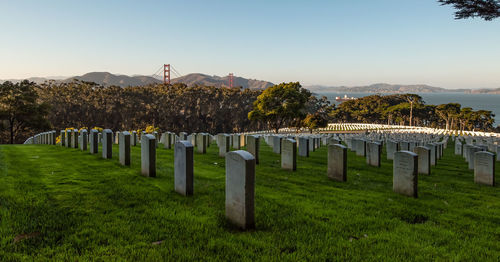 Panoramic view of cemetery against sky during sunset