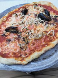 Close-up of pizza served in plate