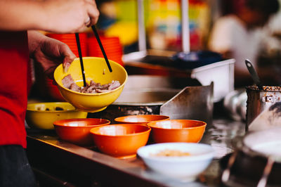 Close-up of hand holding food