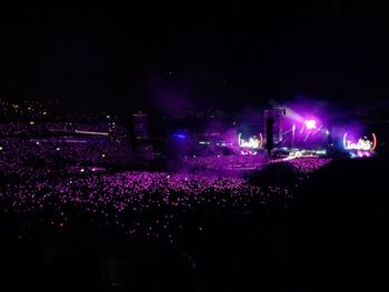 Silhouette of people enjoying at night