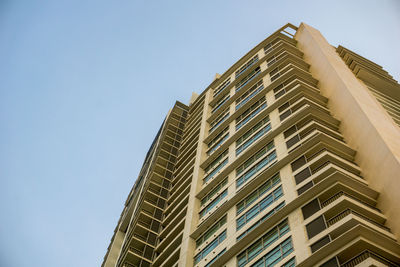 Low angle view of modern building against clear sky